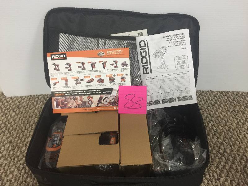 lot 83 image: RIDGID GEN5X 18-Volt Brushless Impact Wrench Kit  open box never used