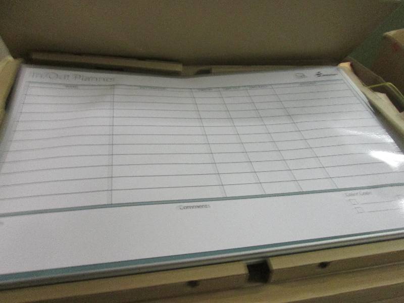 lot 29 image: in and out planner board a liitle b...