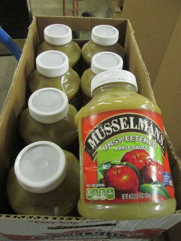 lot 556 image: 846oz musselmans unsweetened appl...
