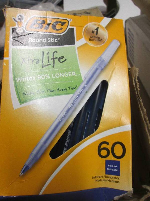 lot 143 image: 8 boxes of bic blue pens 60 per box...