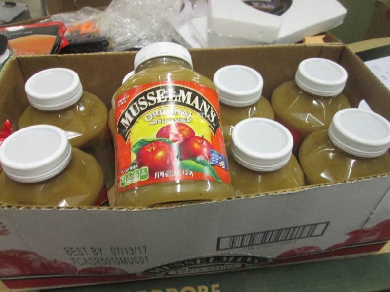 lot 214 image: 1 case of 8-48oz jars of musselman...