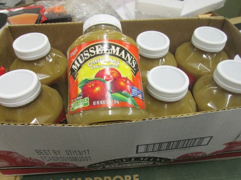 lot 215 image: 1 case of 8-48oz jars of musselman...
