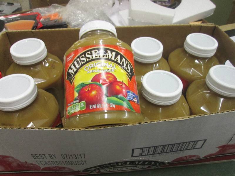lot 216 image: 1 case of 8-48oz jars of musselman...