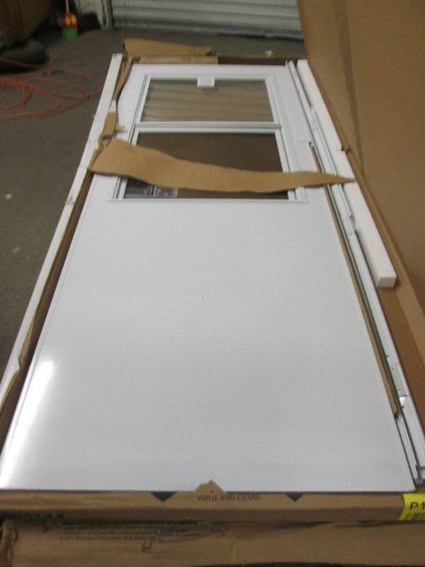 lot 272 image: emco 30x80 storm door left or rig...