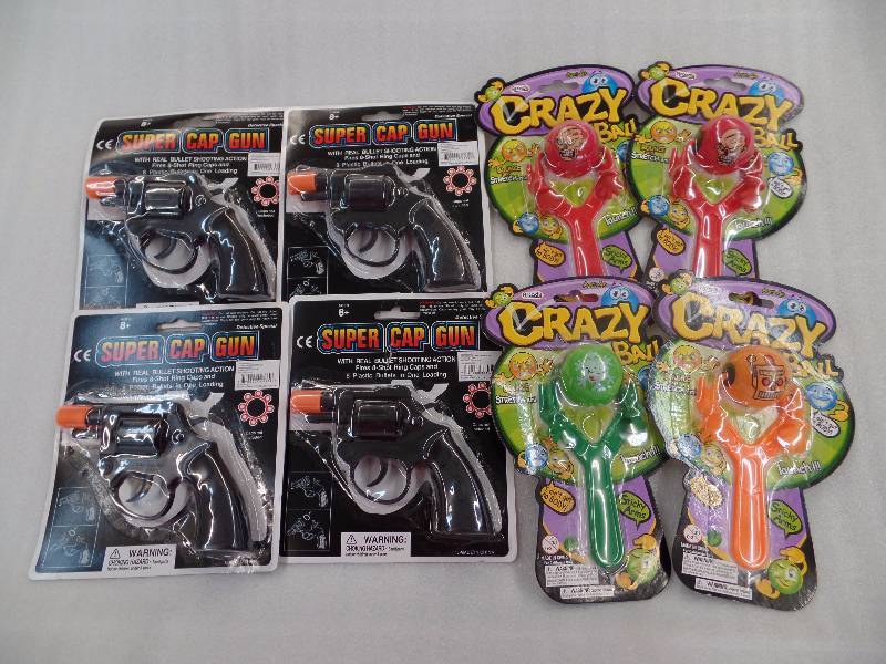 Super Cap Guns & Crazy Ball Sling Shot