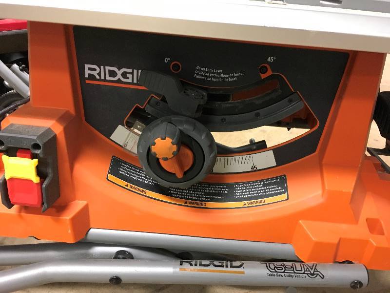 Ridgid 15 Amp 10 in. Heav-Duty Portable Table Saw with Stand in working conditions