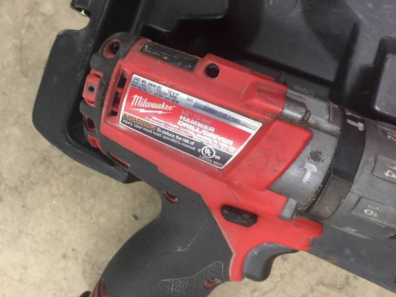 Milwaqukee M12 FUEL 12-Volt Lithium-Ion Brushless Cordless 12in. Hammer DrillDriver and Impact Combo Kit w(2) Batteries, Charger used in working condition