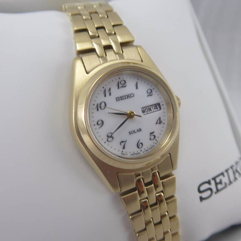 lot 38 image: Seiko Womens Goldtone White Dial Calendar Dress Watch