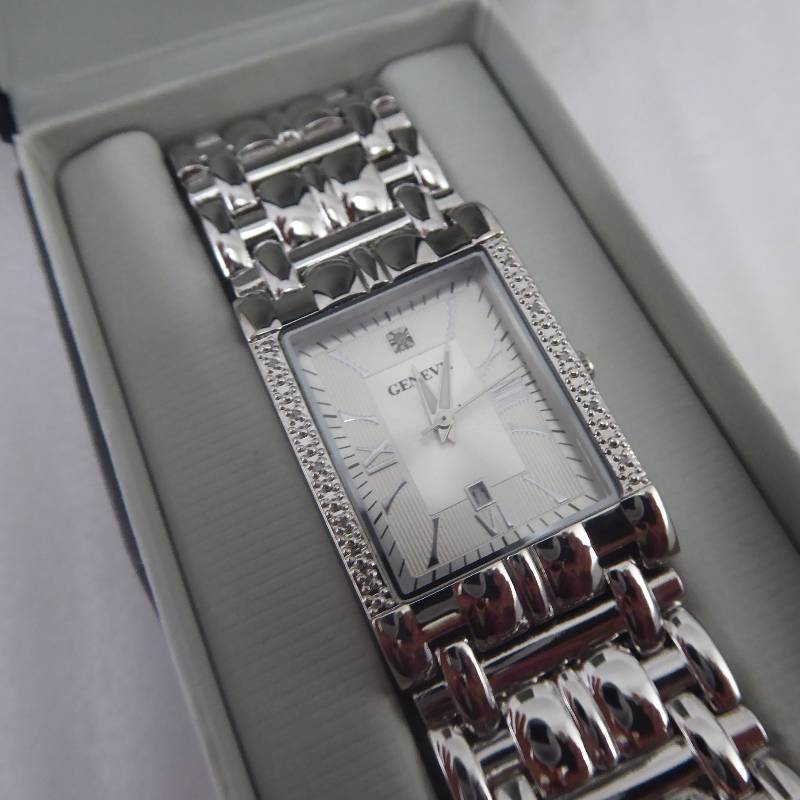 lot 104 image: Geneve Mens Silver .05 Carat Diamond Dress Watch