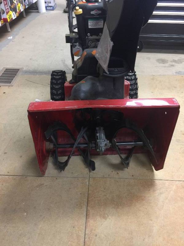 Toro Power Max 724 OE Snow Blower in working conditions