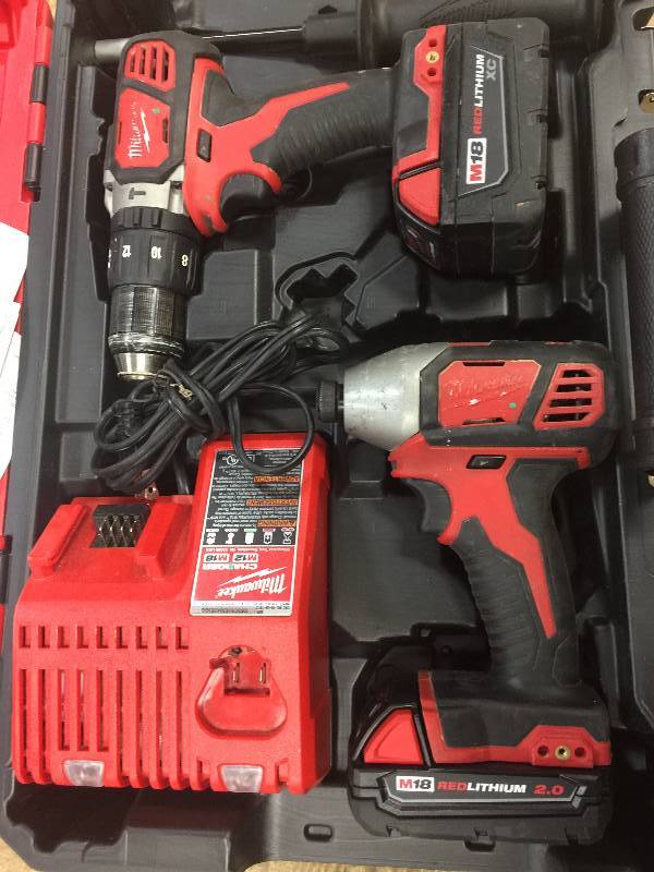 Milwaukee M18 Hammer Drill & Impact Driver used in working conditions