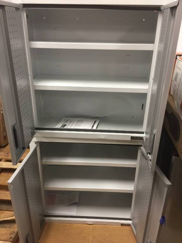 Lot of 2 Gladitator Garage Works 24 in and 30 in Welded-Steel Wall Gearbox Cabinets in new conditions missing key whit small damage