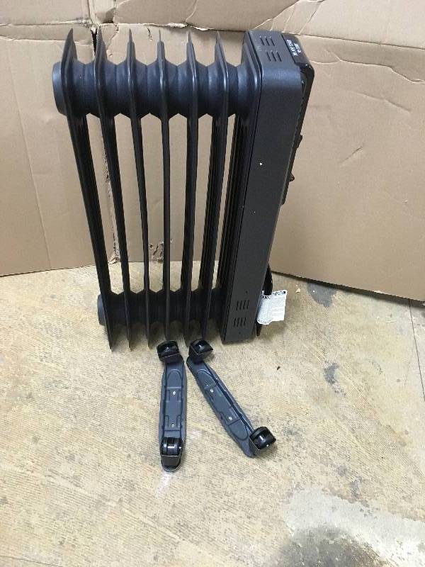 Oil-Filled Radiator Heater  in working conditions whit small damage