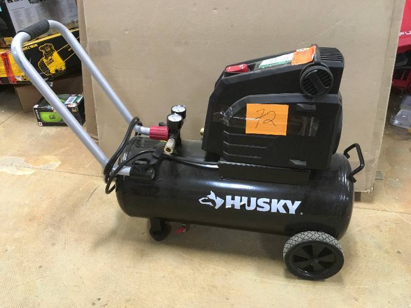 lot 72 image: Husky 8 Gal. Portable Oil Free Electric Air Compressor in like New working conditions