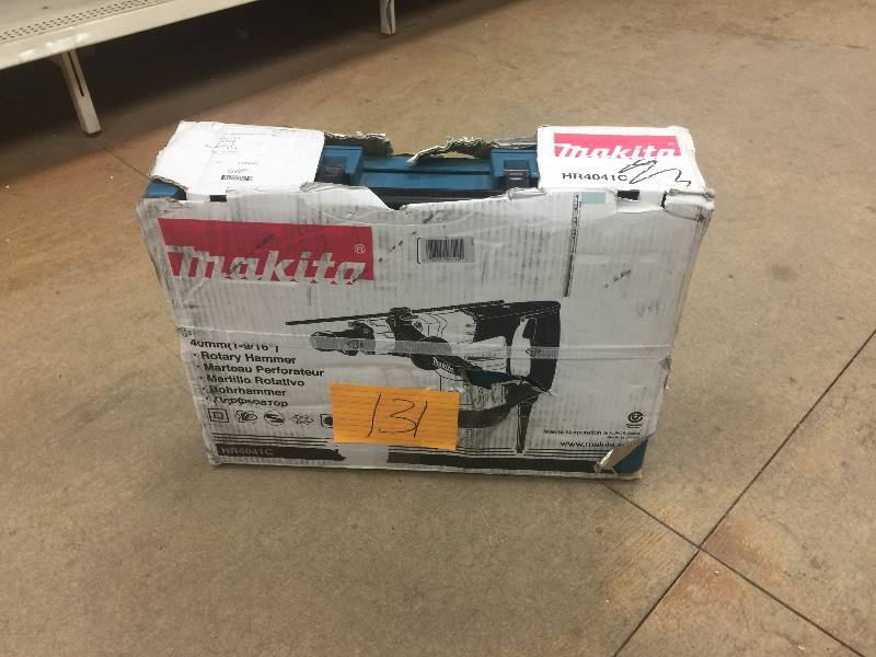 lot 131 image: Makita 12 Amp 1-916 in. Corded Spline ConcreteMasonry Rotary Hammer Drill with Side Handle, D-Handle and Hard Case not used