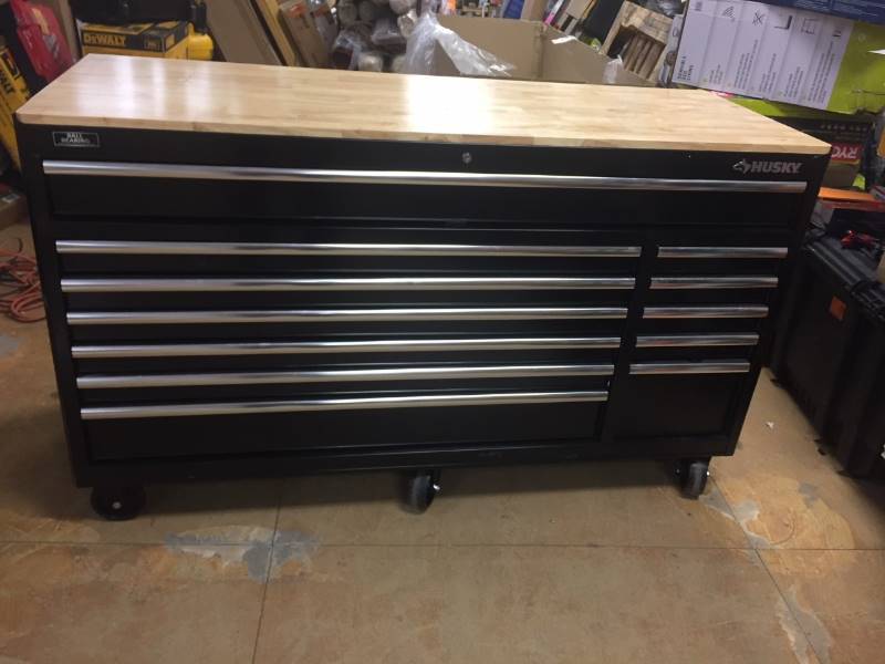 lot 132 image: Husky  66 in. W 24 in. D 12-Drawer Heavy-Duty Mobile Workbench, Black open box never used