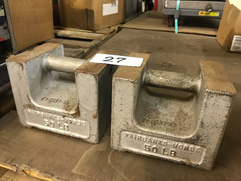 2x 50 LB. WEIGHTS