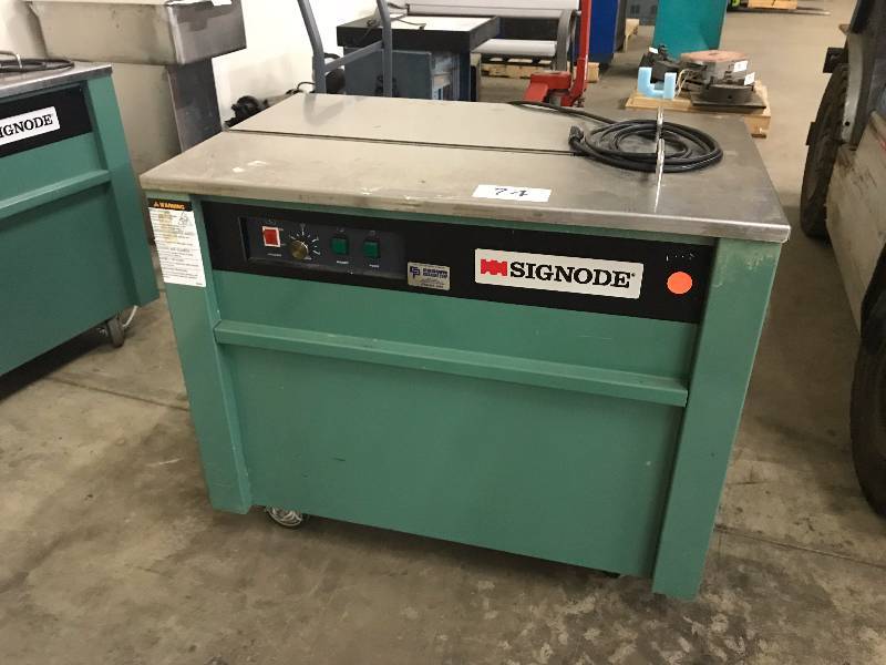 BOX STRAPPING MACHINE