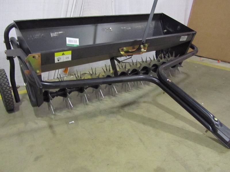 lot 10 image: Brinly-Hardy 40 in. Tow-Behind Combination Aerator-Spreader