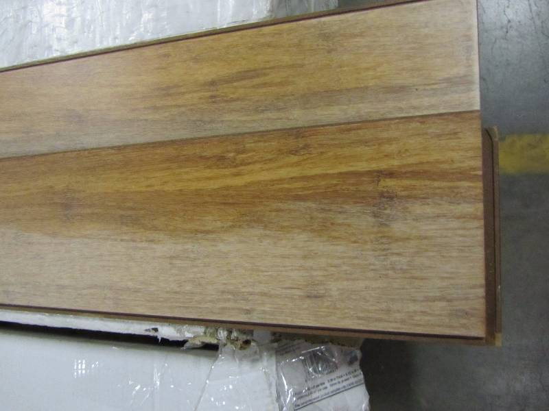 lot 78 image: Wire Brushed Strand Woven Sand 38 in. T x 5-18 in. W x 72-78 in. L Engineered Click Bamboo Flooring (x8 cases)