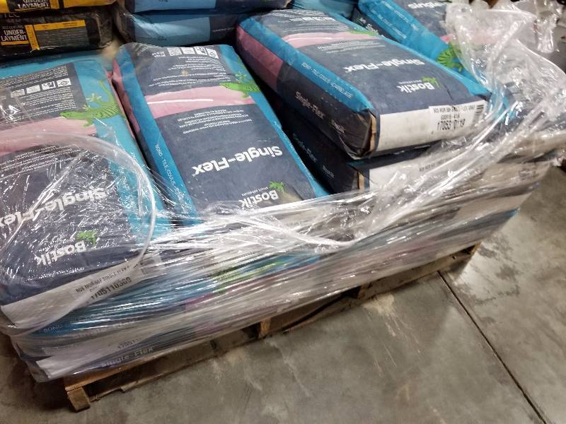 lot 113 image: Lot of (8) 50lb. Bags of Bostik Single-Flex