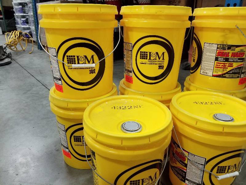 lot 60 image: Lot of (4) L&M 5-Gallon Seal Hard Concrete Sealer