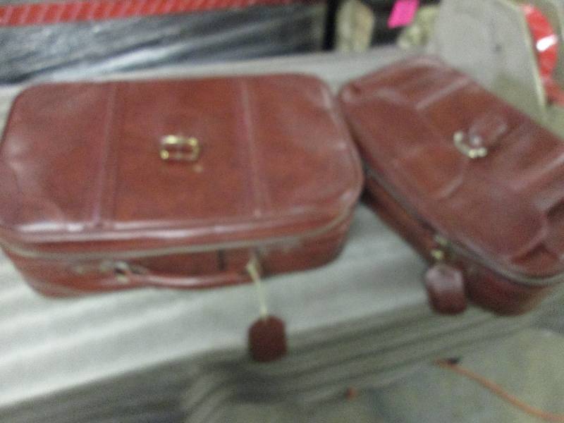 Lot of 2 Nesting Suitcases...