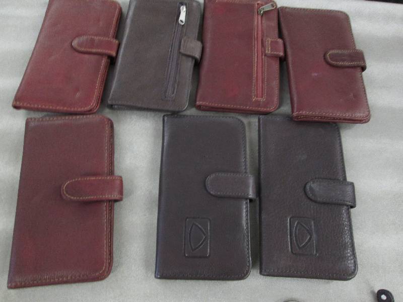 Lot of 7 Checkbook Leather Clutches...