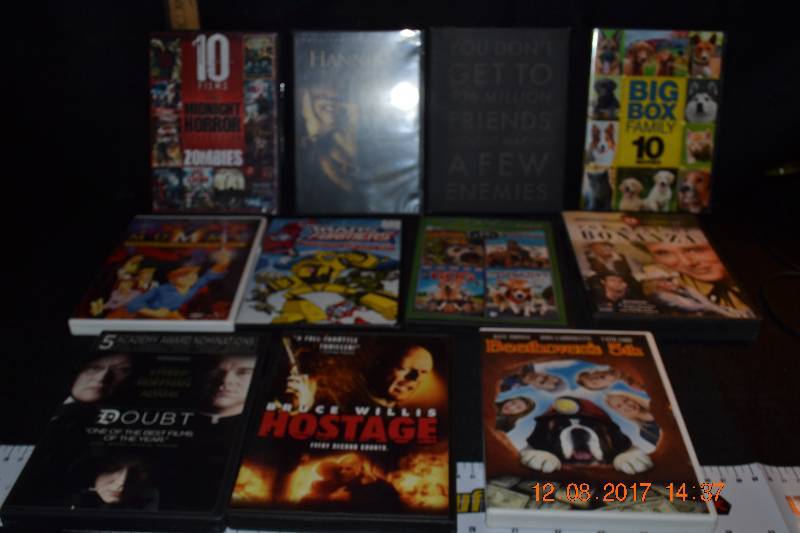 lot 95 image: Box Full of DVDs