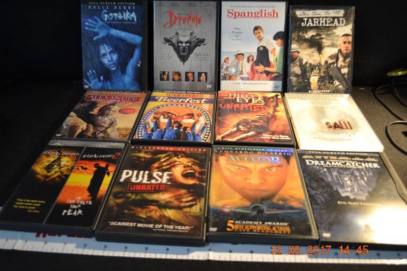 lot 98 image: Box Full of DVDs