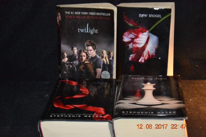 lot 142 image: Twilight, New Moon, Eclipse and Breaking 75Dawn BooksTwilight, New Moon, Eclipse and Breaking Dawn Books