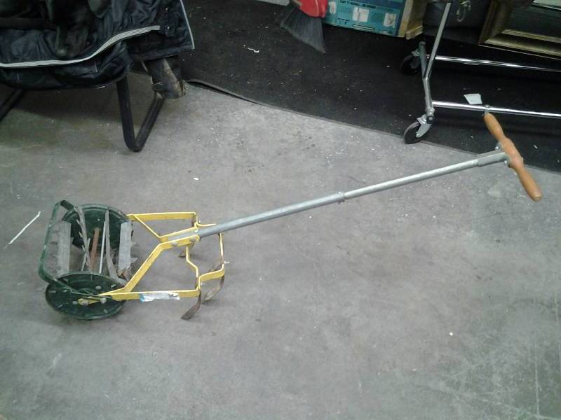 lot 10 image: Old Garden Tiller Tool