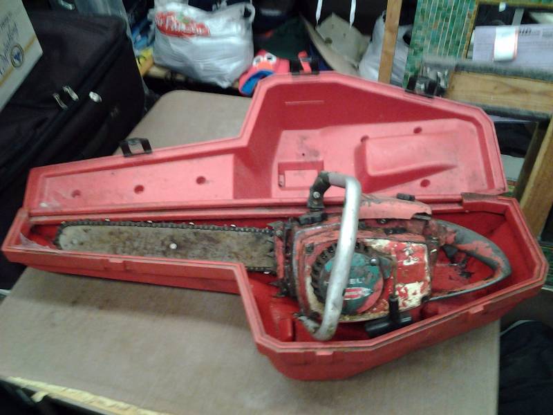 lot 16 image: Old Homelite Chain Saw With Case