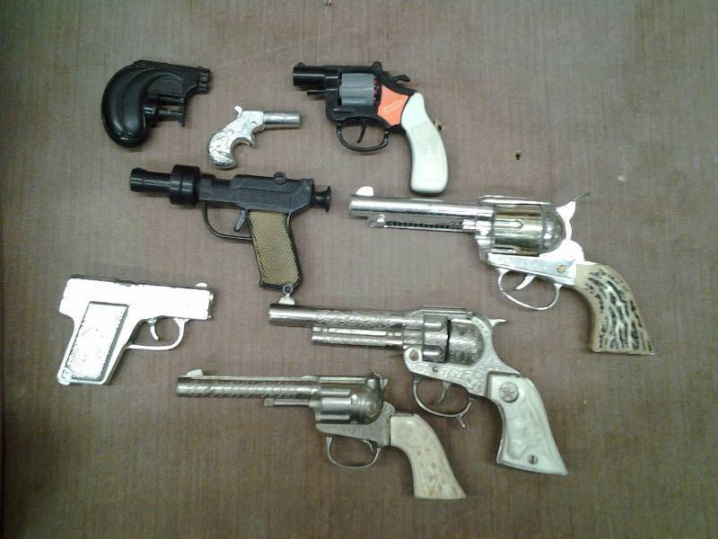 lot 33 image: Collection Of Old Toy Cap Guns