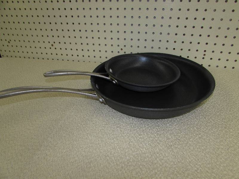lot 142 image: CALPHALON 2PK OMELETTE FRYING PANS