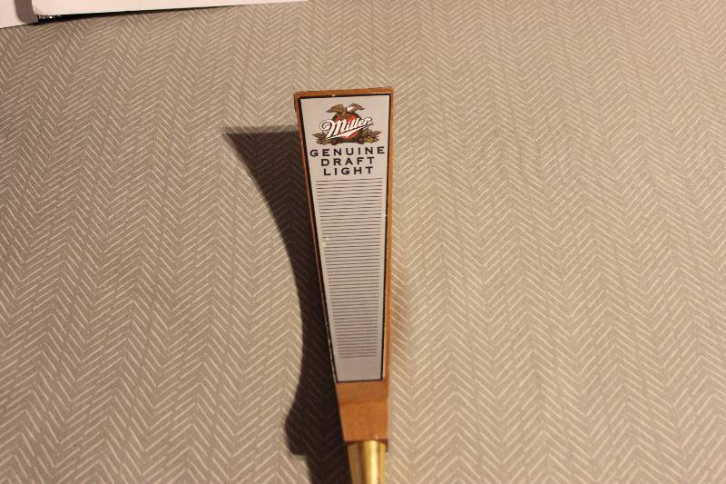 Miller genuine draft light beer tap...