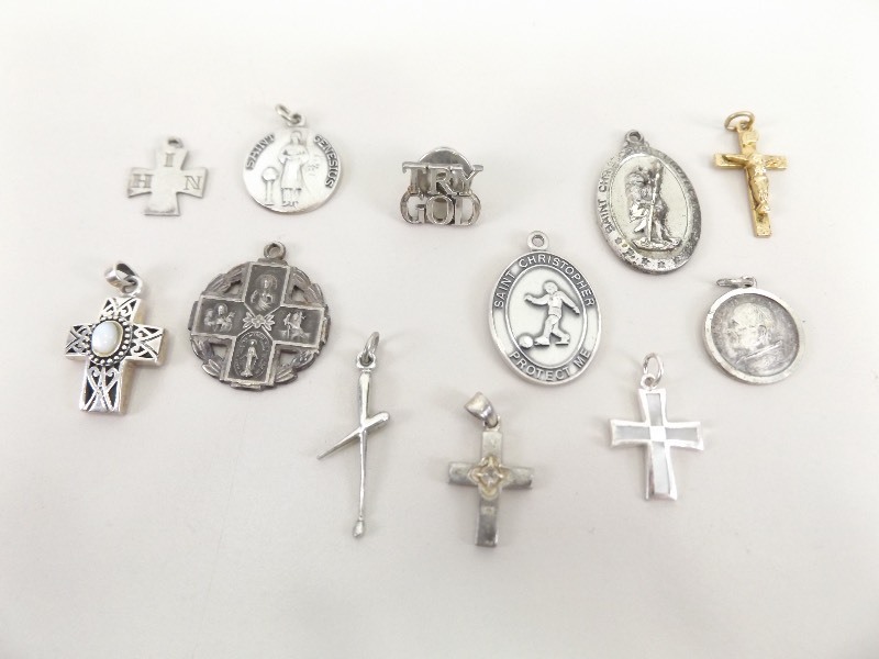12 Vintage&nbsp.925&nbspSterling Silver Religious Pendants (34.7 grams Total Weight)