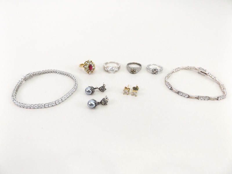 Lot of Misc .925 Sterling Silver and Crystal Rings, Bracelets, Earrings, etc. (42.7 grams Total Weight)