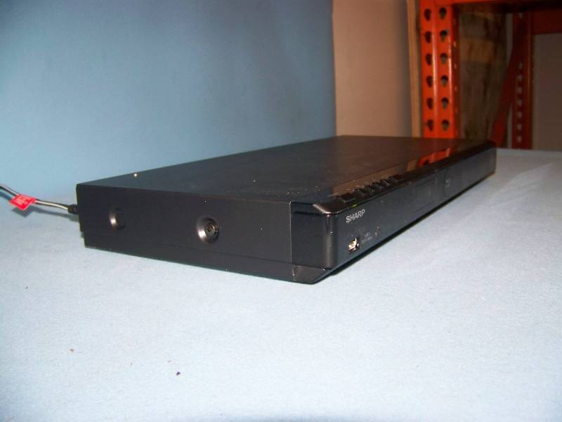 lot 15 image: Sharp, Blu-Ray  DVD Player in original Box