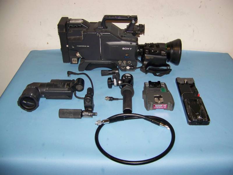 lot 44 image: Sony, Video Camera with Viewfinder, Camera Controls and Tripod Plates in a Shok-Stop, Hard Sided Travel Case