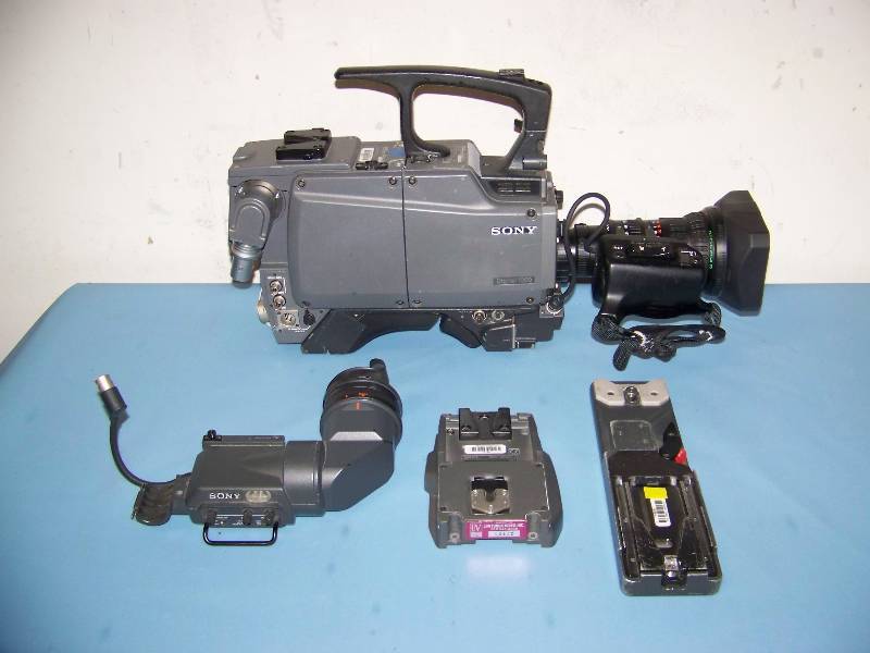 lot 45 image: Sony, Color Video Camera with Fujinon Zoom Lens, Viewfinder and Tripod Plates in a Shok-Stop, Hard Sided Travel Case
