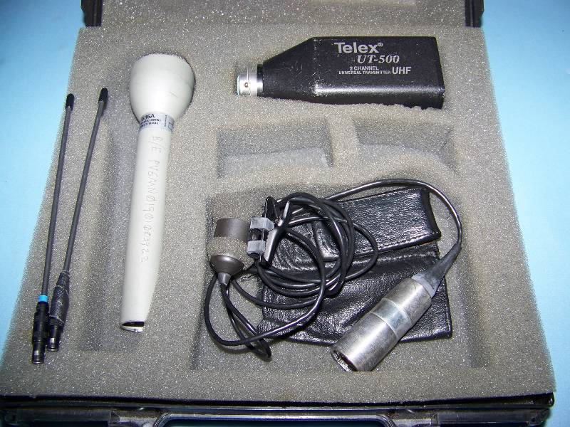 lot 102 image: Telex, UT-500, 2-Channel Universal Transmitter with (1) Electro-Voice, Wired Hand-Held Microphone  Mic and (1) Wired Lapel Microphone  Mic in Hard Sided Case