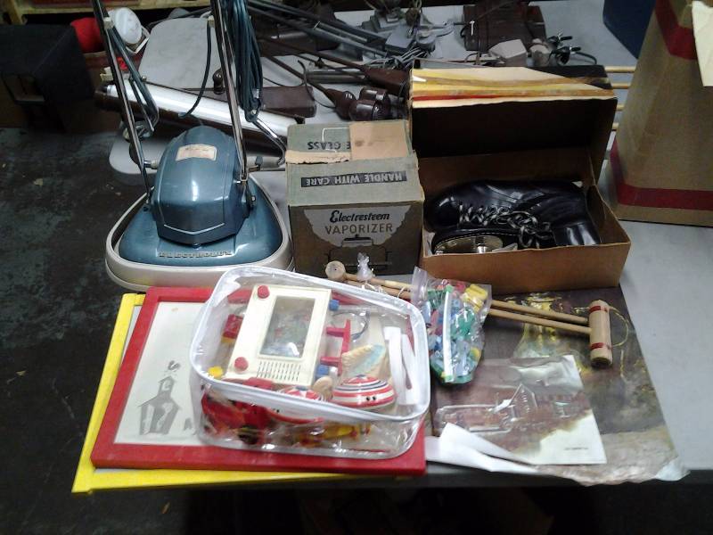 lot 39 image: Vintage Electrolux Floor Scrubber, Vintage Toys, Vaporizer, Canadian Flyer Skates Size 11