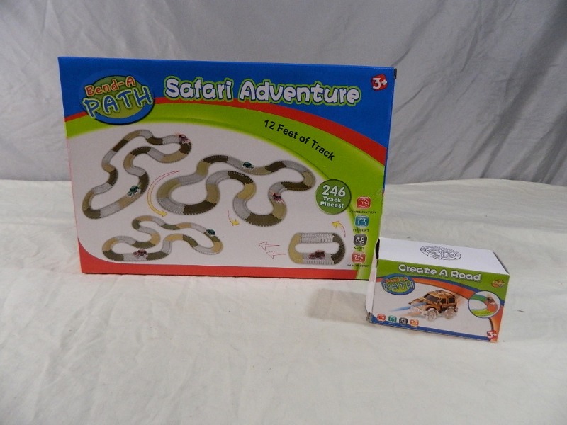 lot 23 image: New Bend a Path Safari Adventure and Extra Car