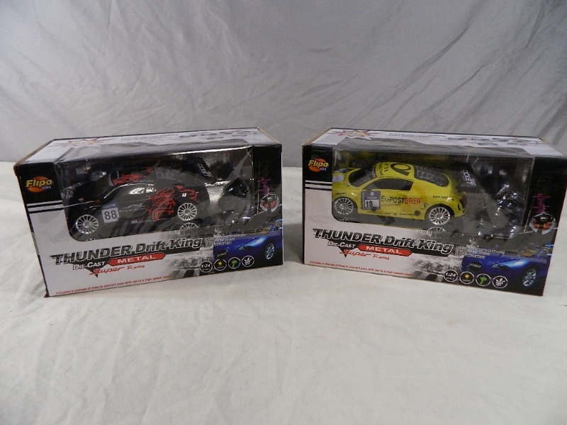 lot 24 image: 2 New Metal RC Drift Cars