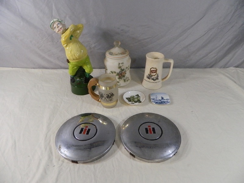 lot 36 image: Schlitz Beer Mug, IH Hub Caps, and More