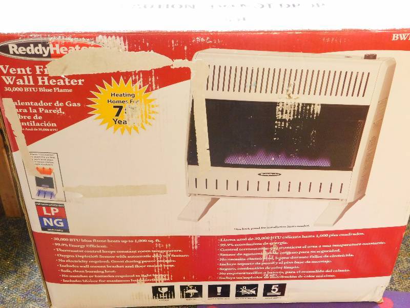 lot 19 image: 30,000 BTU Blue Flame Dual-Fuel Wall Heater with Blower