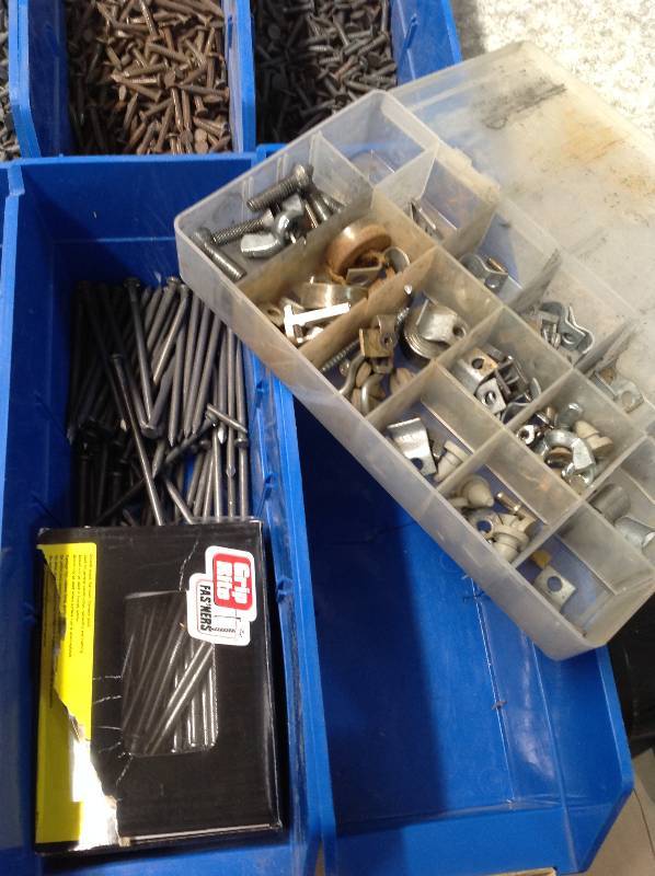 Hardware Variety of Nails , bolts and fasteners in bins