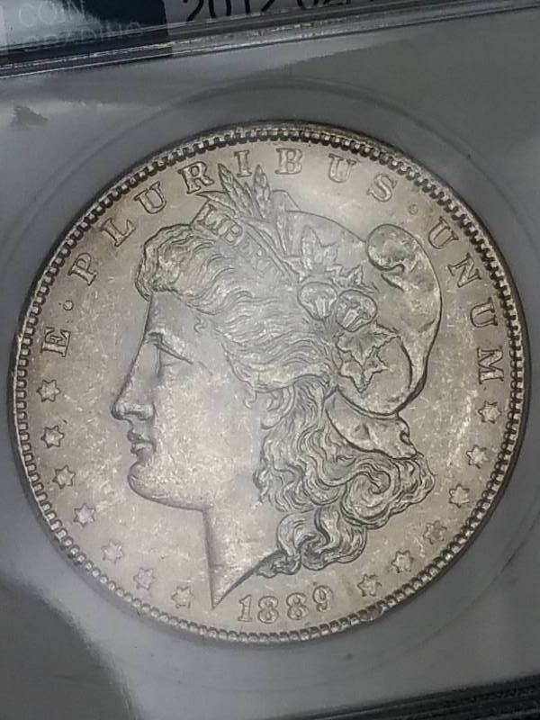 lot 53 image: 1889 P Morgan Silver Dollar - MS65