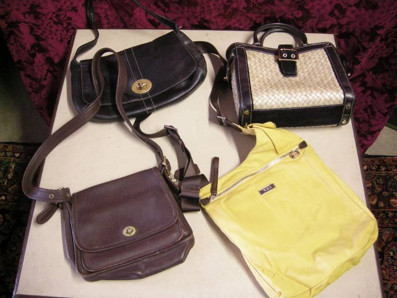 lot 44 image: Coach and Tumi Purses